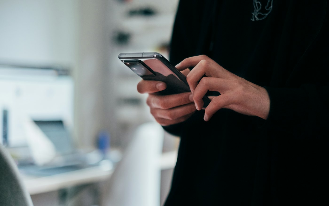 Field staff finishing work on a phone